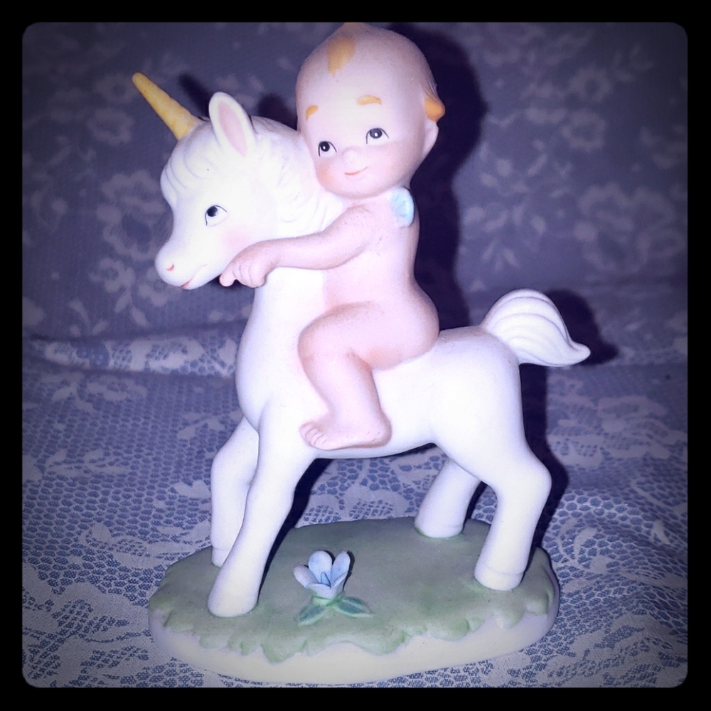 Baby angels with baby unicorn